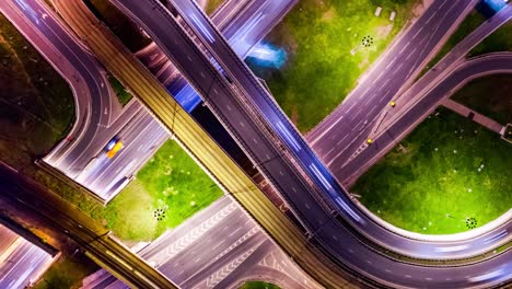 Night-Timelapse-Aerial-view-of-a-freeway-intersection-traffic-trails-in-night-Moscow.-Loop-Timelapse.